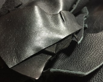 Black Leather Scraps/Remnants. Choose from 1 lb or 1.5 lb.