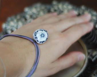 Charm bracelet with hand painted ceramic bead