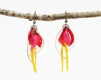 Flower-shaped earrings. Upcycled using shampoo bottles