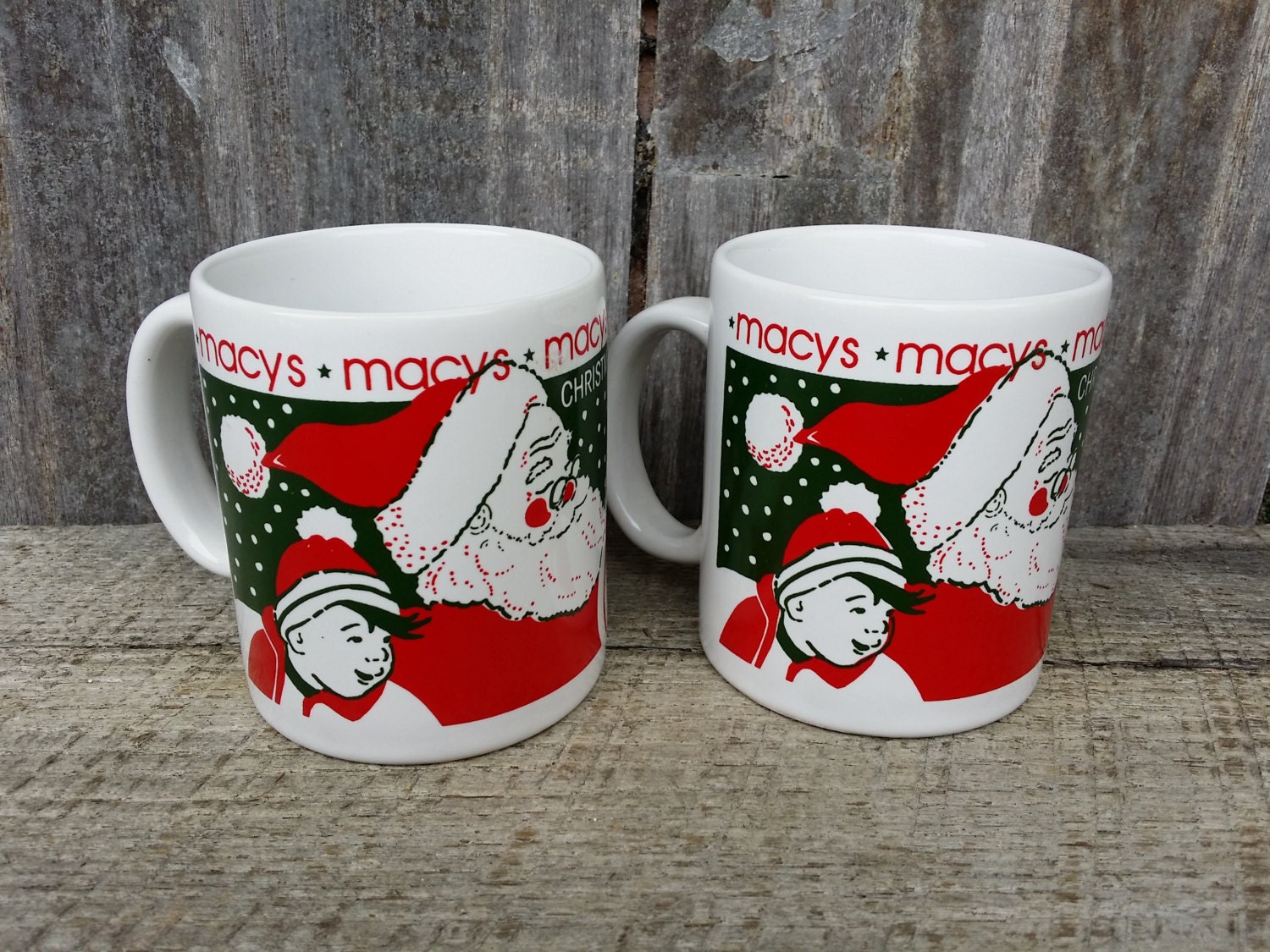 Pair of 1987 Macys Christmas mugs