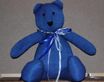 Blue stuffed teddy bear with ribbon bow tie