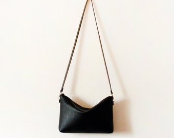 Black leather crossbody bag with zipper