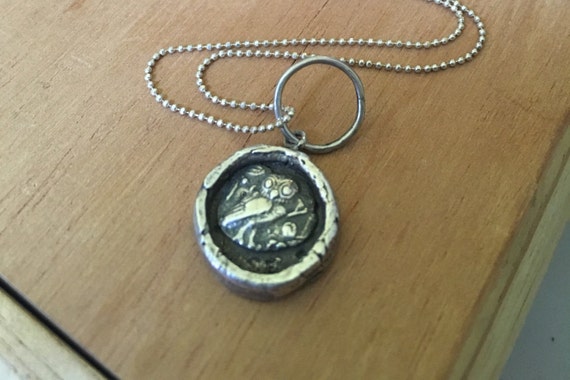 Fine silver owl in a frame pendant; Sterling Silver chain Alength 22 inches