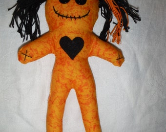 orange voodoo doll