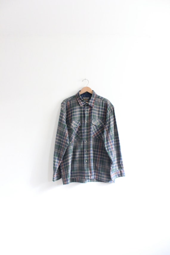 Vintage Flannel Shirt 2090 Find a shirt and blouse for every day with Urban Outfitters' designs including button-down, polo and flannel shirts, off-the-shoulder, maxi tops and more.