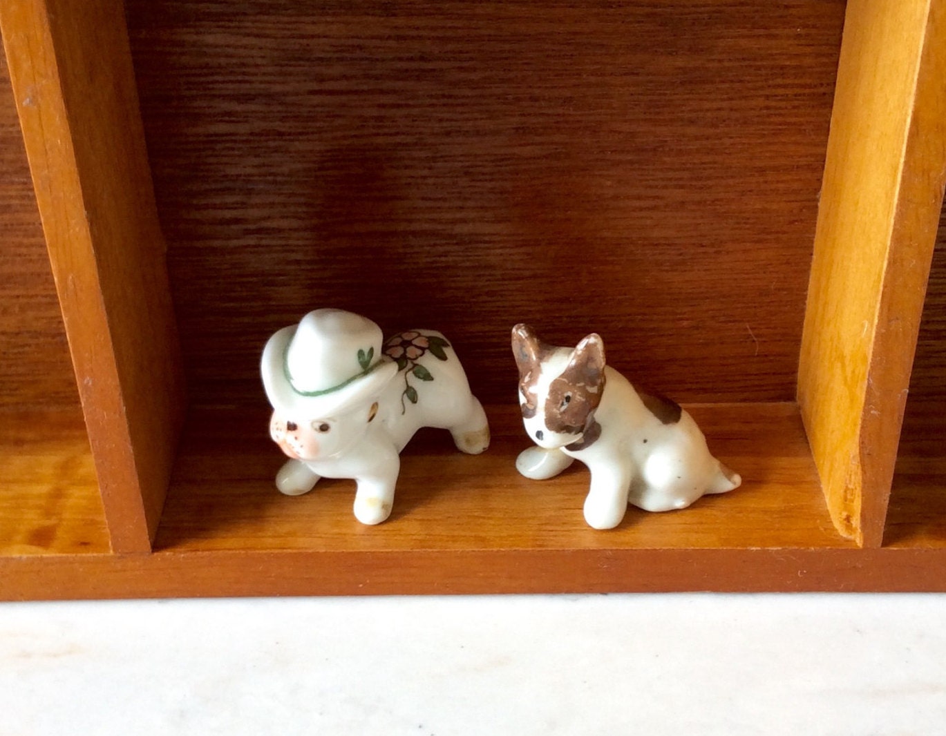 small porcelain dogs