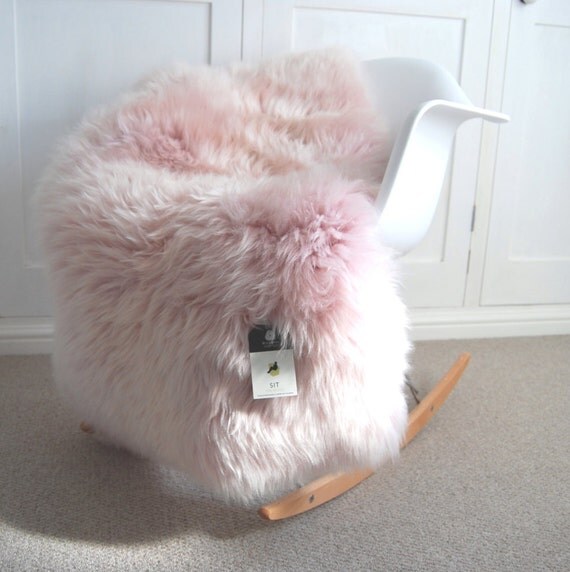 Dusky Pink Sheepskin rug pale pink and super fluffy absolutely