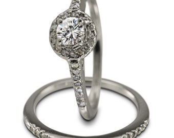 Diamond Bridal Set In 14k White Gold Featuring A Halo Engagement Ring Design