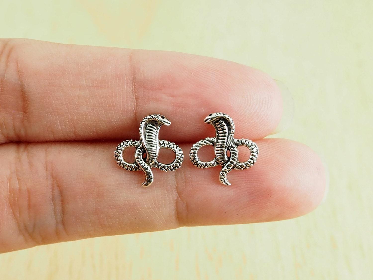 A pair of Cobra Snake Stud Snake Earrings 925 Sterling