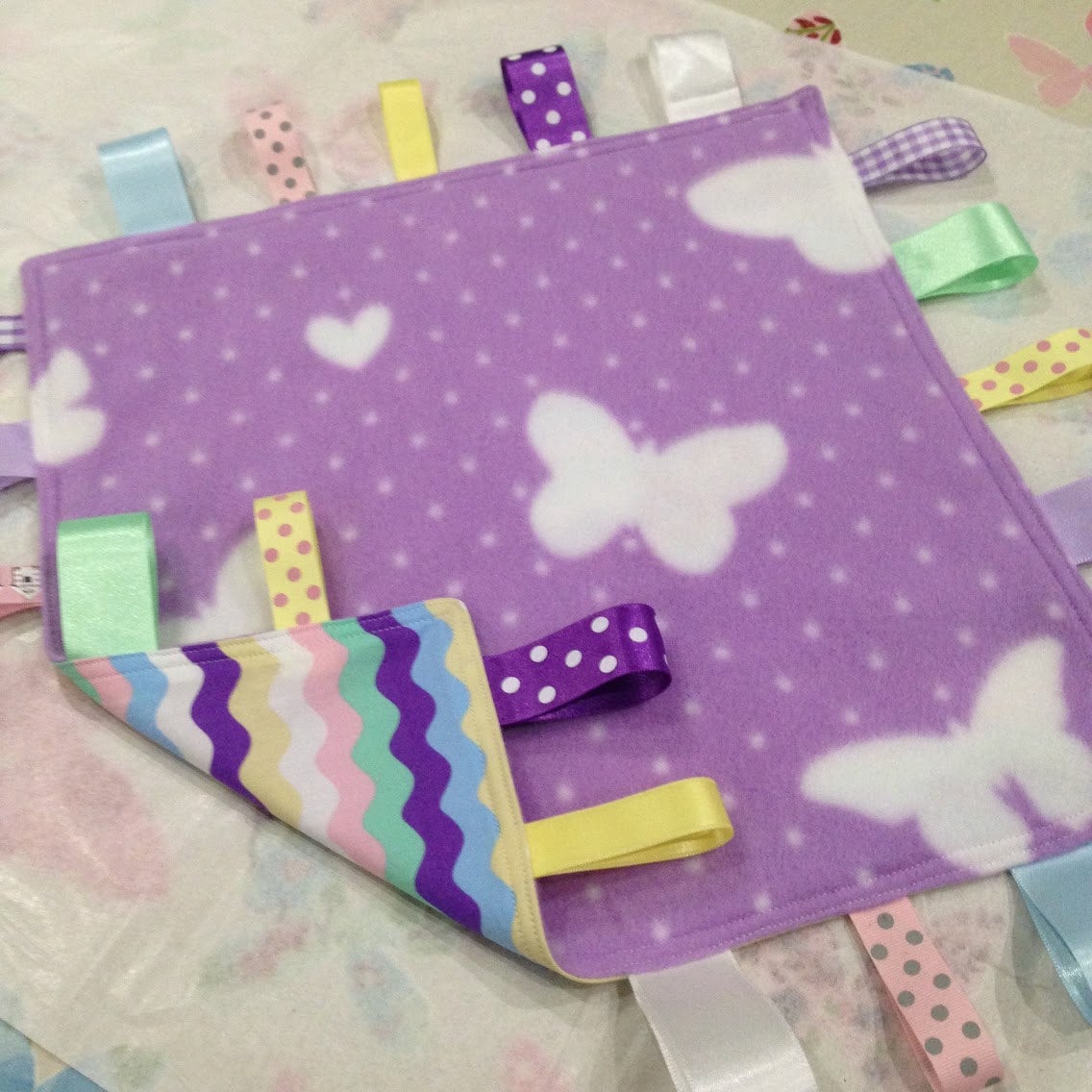 Personalised baby taggie blanket