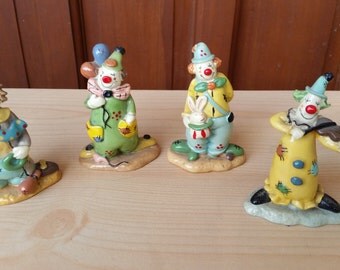 Set of 4 Porcelain Clowns