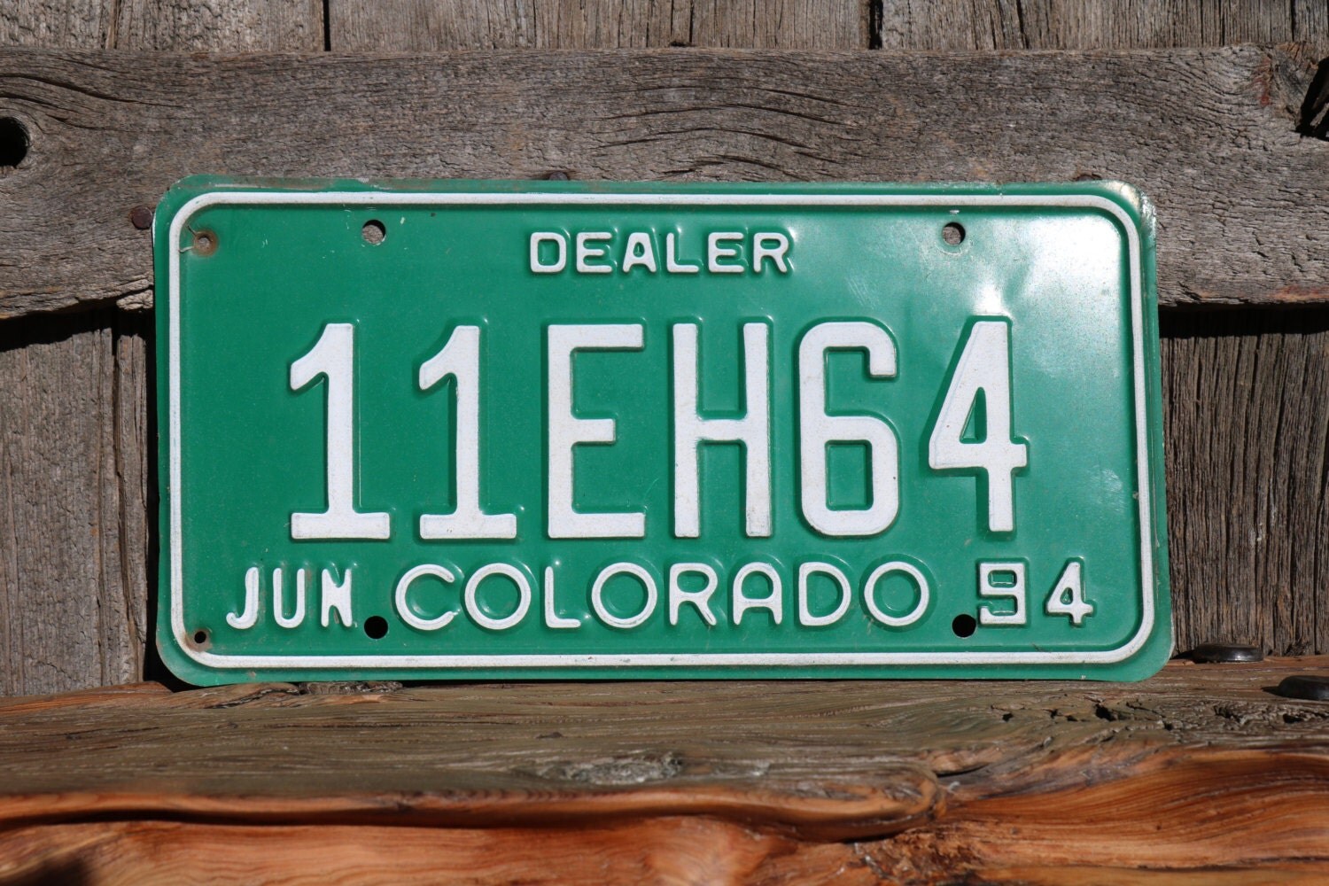 Colorado Dealer License Plate Number 11EH64 by AmericanAntique