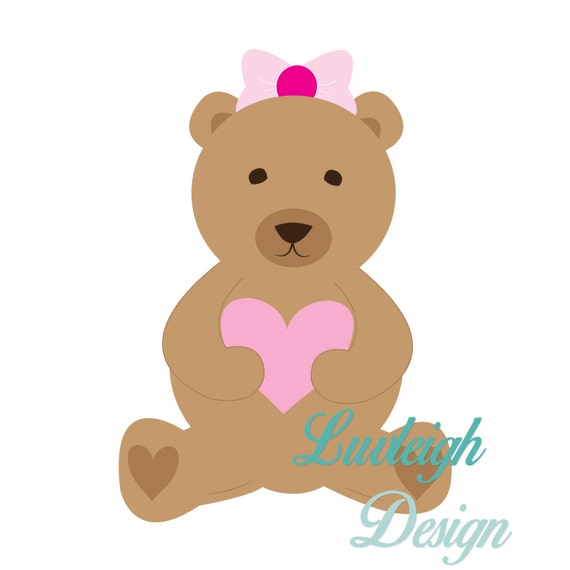 brown teddy bear with pink bow