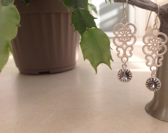 Earrings with lace silver and grey swarovski stones.