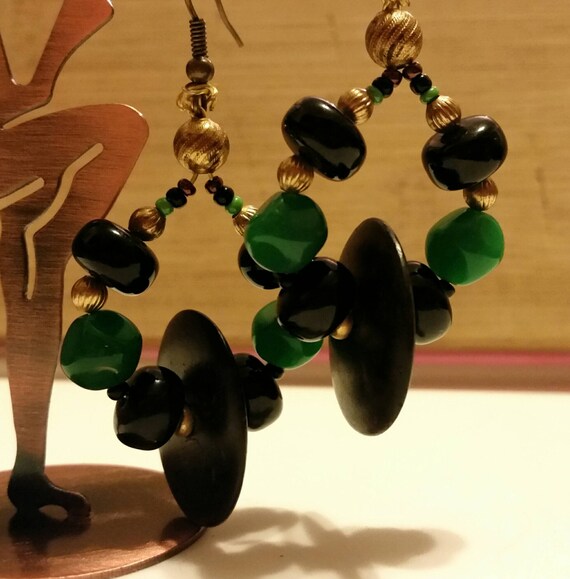 Items similar to Vintage green, bronze, and black earrings on Etsy