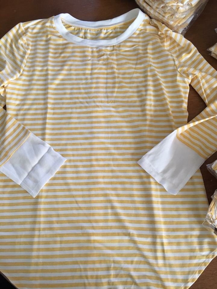 stripped orange shirt