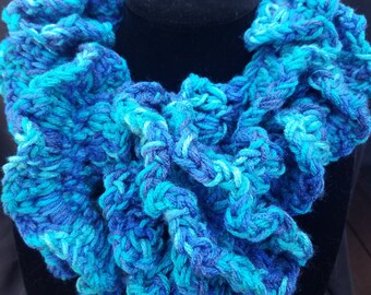 Ruffled blue scarf.