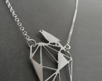silver bird necklace, bird on a rock, geometric bird necklace, geometric jewelry, silver necklace