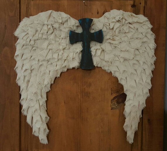 Items similar to Angel wings wall decor dark brown cross with turqoiuse