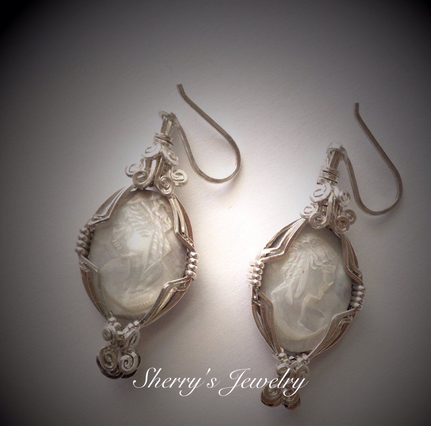 Handmade Cameo earrings cradled in Sterling by sherrysjewelry