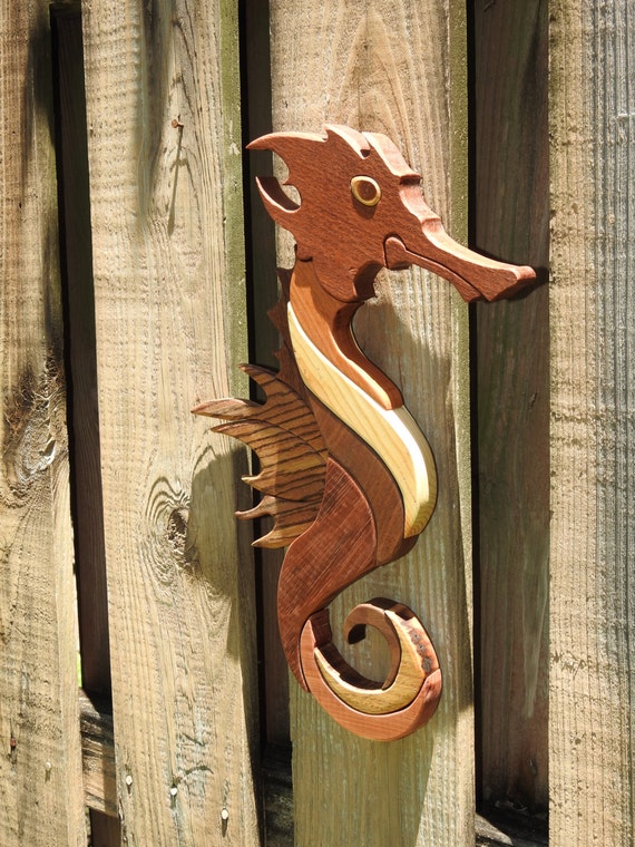 wooden seahorse statue