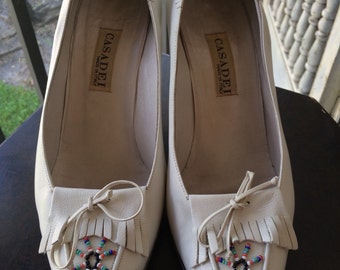 Vintage Casadei white leather pumps