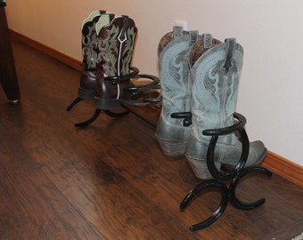 Horseshoe boot rack holds three pairs or six shoes.