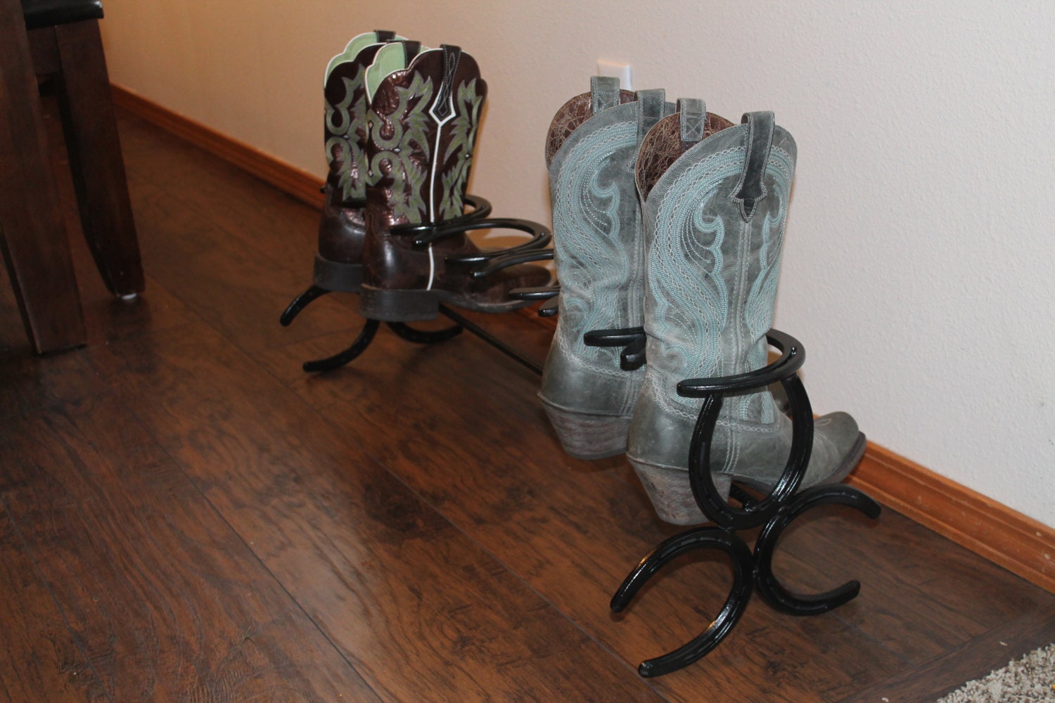 Horseshoe boot rack holds three pairs