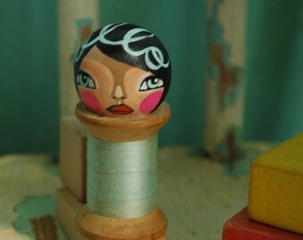 wooden spool doll