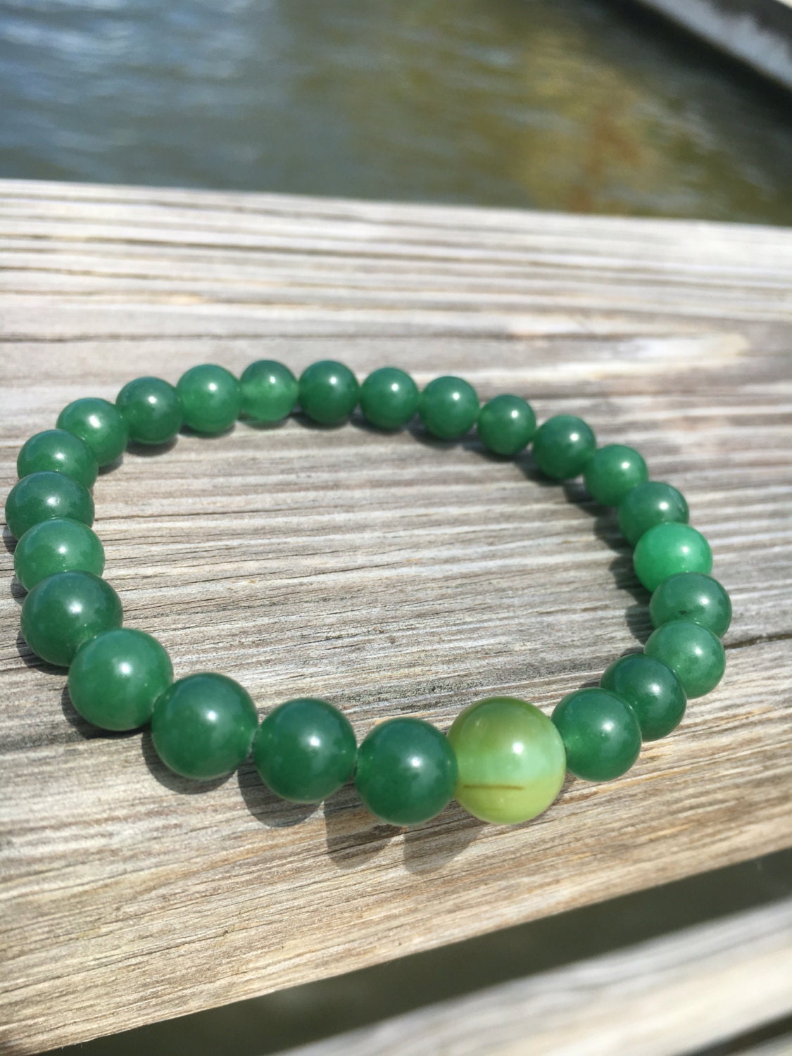 Genuine green jade stretch bracelet. 8 mm jade beads.