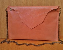 salmon pink clutch bag