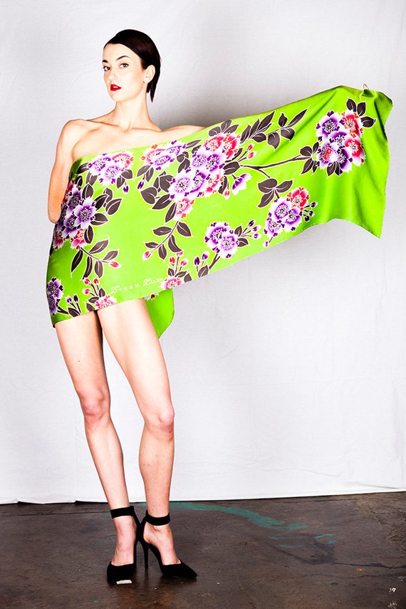 Hand Painted Silk Scarf with Purple and Red Flowers. A lime green background. Batik Painted on Charmeuse 100% silk. size 21" x 72".