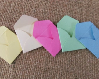 mini envelopes, tiny envelopes, for invites, for scrapbooks, cardmaking crafts, pastel coloured embellishments, pink, mint, baby blue, cream