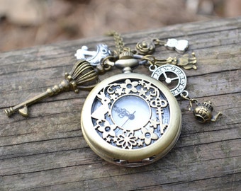 Alice in wonderland Pocket Watch Necklace,Big locket watch pendant necklace, with key mushroom cheshire cat clock tea pot charms necklace