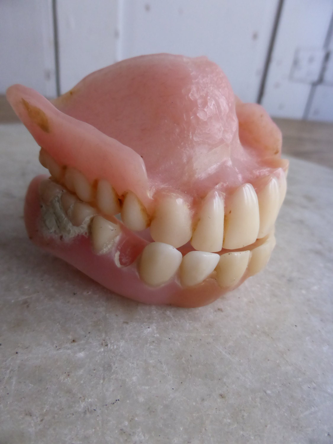 Vintage set of false teeth dentures display only item