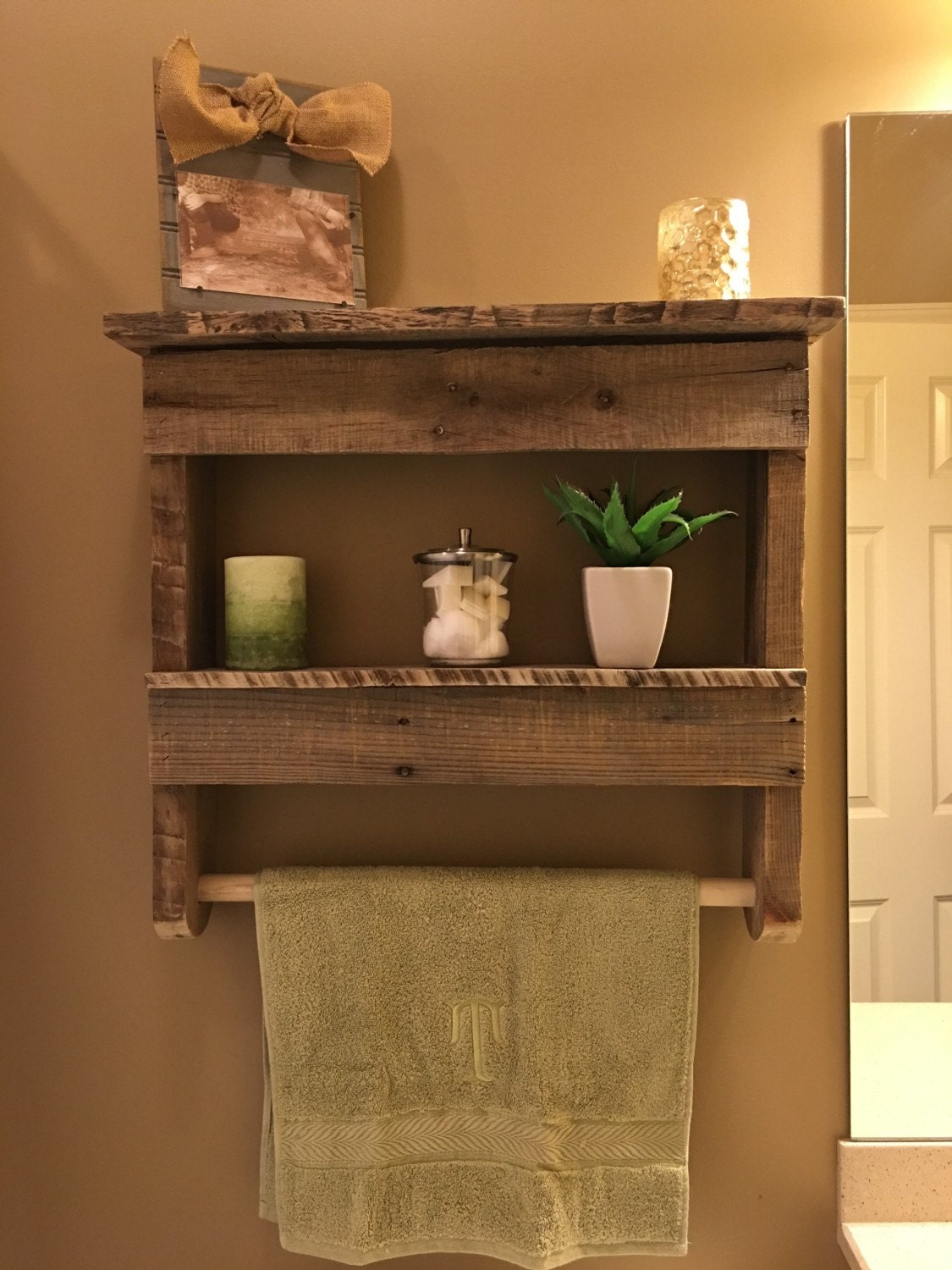 Rustic bathroom shelf with towel hanger