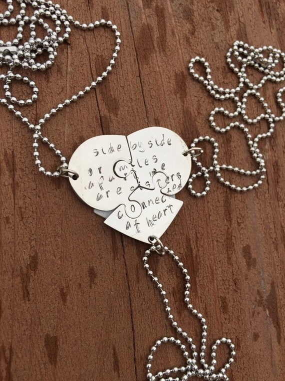 SALE Three puzzle piece necklaces that fit together making a