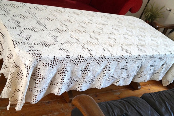 Large crocheted tablecloth. Vintage white rectangular lace