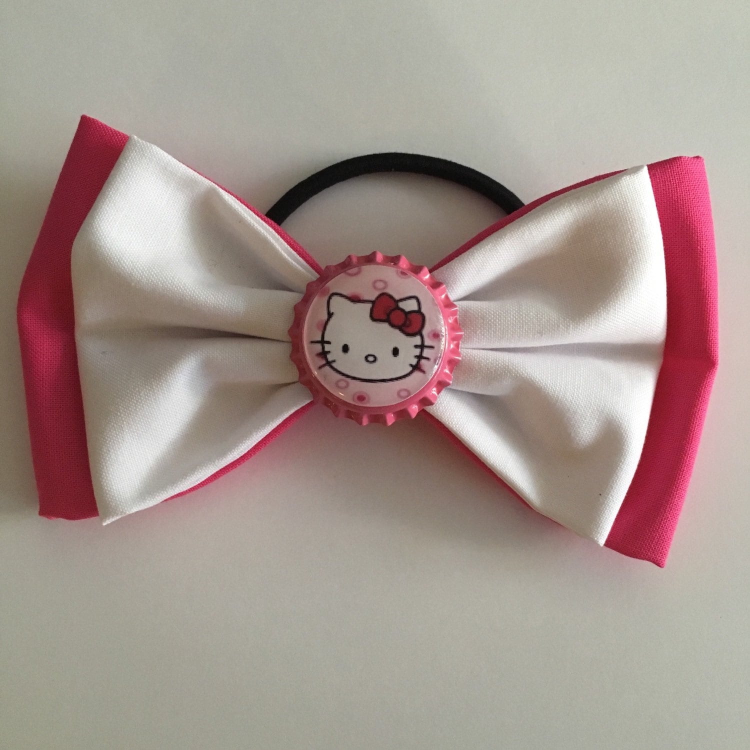 Pink hello kitty bow hair tie by amgcraftsudio on Etsy