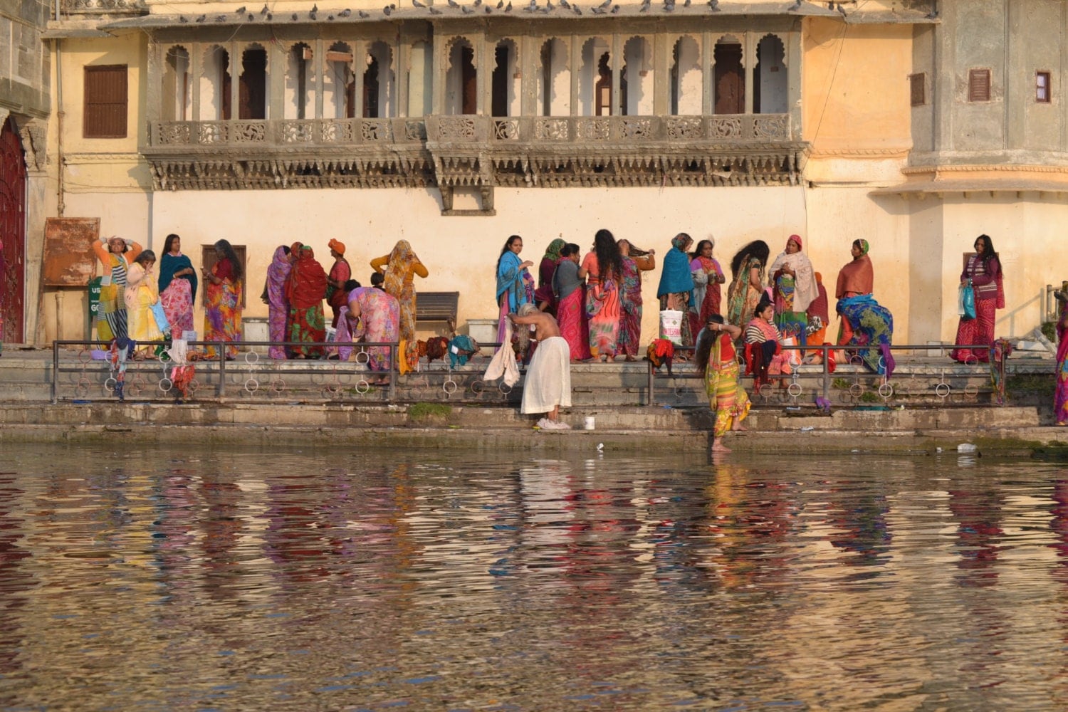 Local Women Bathing Udaipur Rajasthan By Harrietchalmersadams 