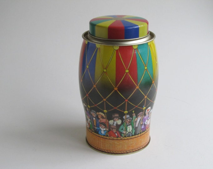 Hot Air Balloon metal candy container, lithograph tin made in england, 1940s people in colourful circus balloon