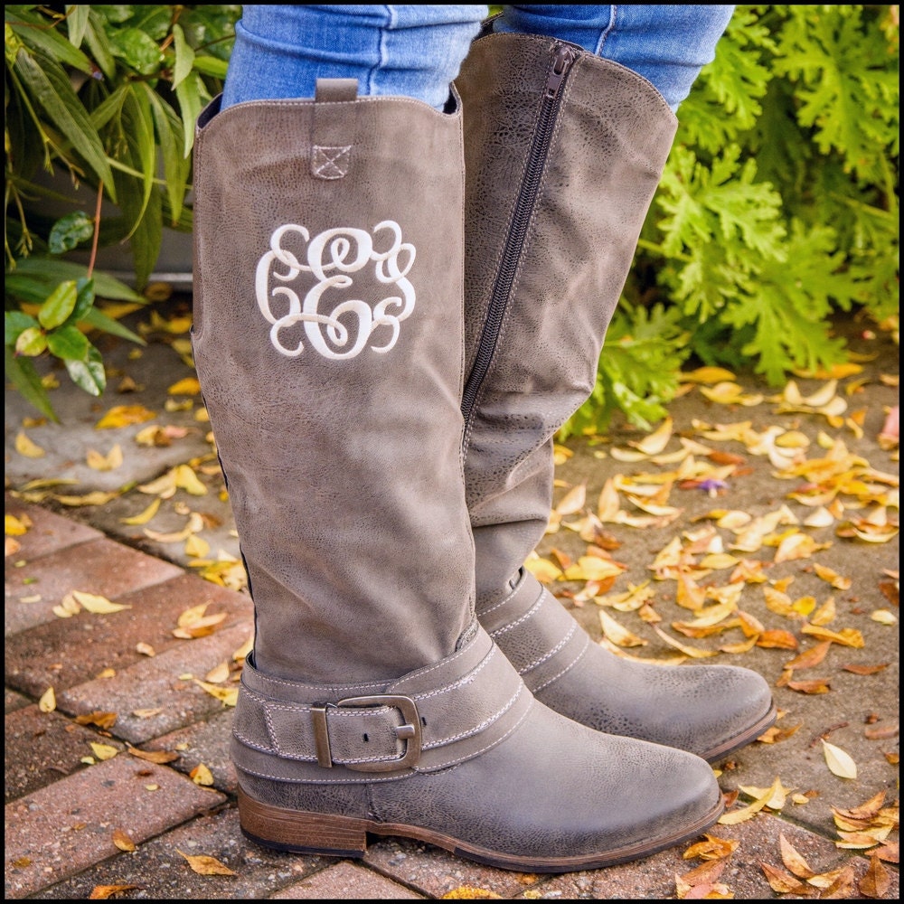 monogram plaque long leather boots