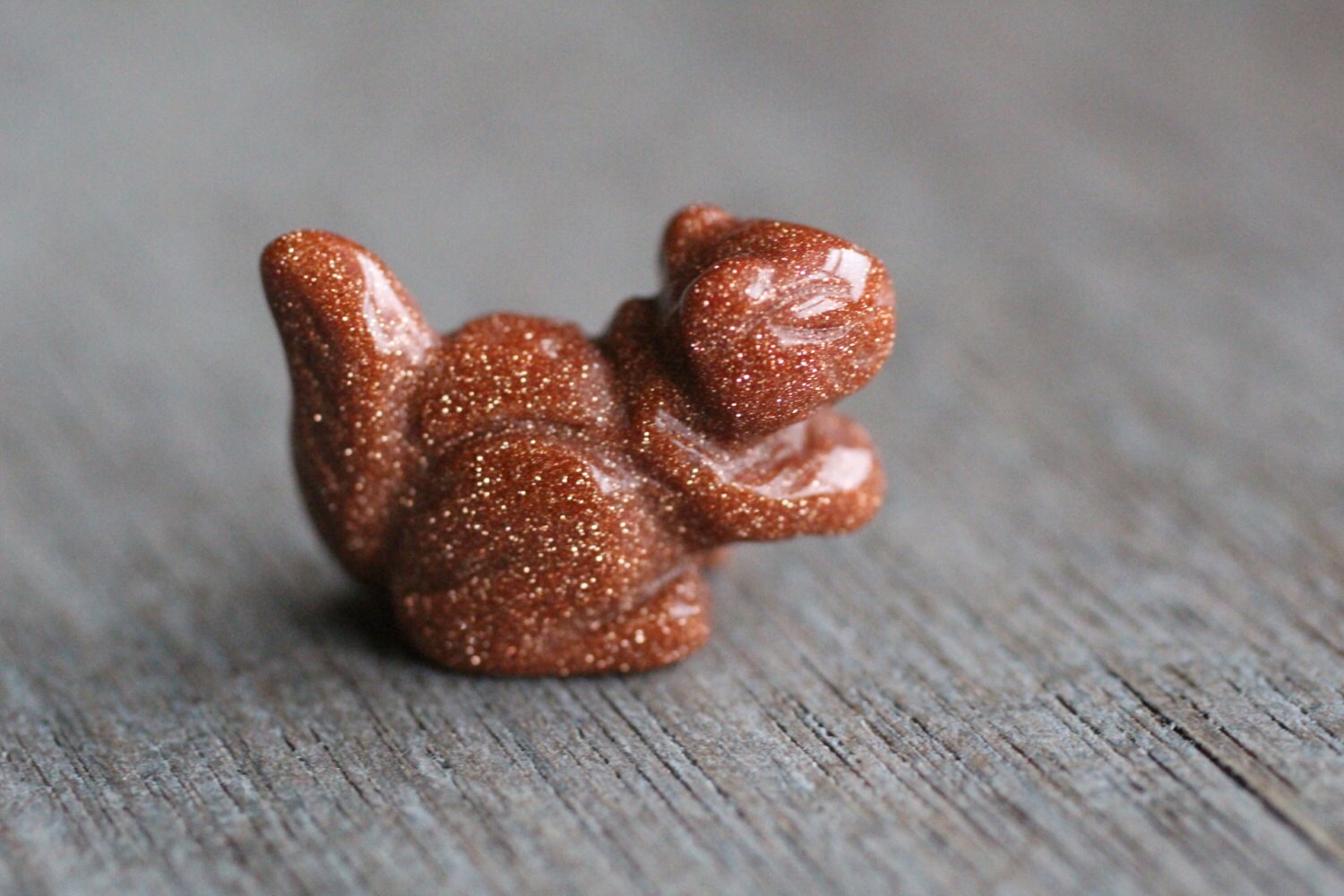 gold squirrel figurine