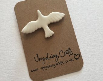Ceramic blue or white Dove brooch
