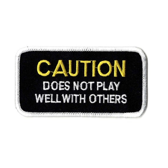 Caution Does Not Play Well With Others embroidered iron on