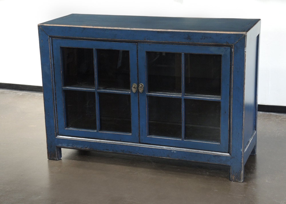 Small sideboard cabinet with glass doors and blue by TerraNovaLA