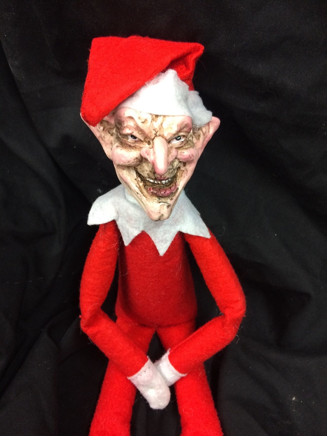 creepy doll elf on the shelf