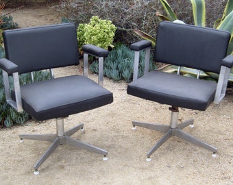Pair of mid century Goodform swivel chairs