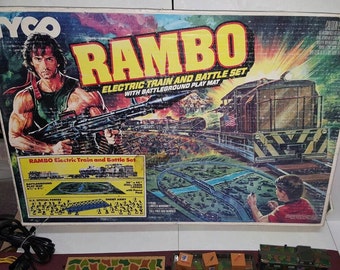 RESERVED for heatherdewsy - Tyco Train Set, Rambo Electronic Train & Battle Set w/Battleground Play Mat, 80's Hollywood Action Figure Icon