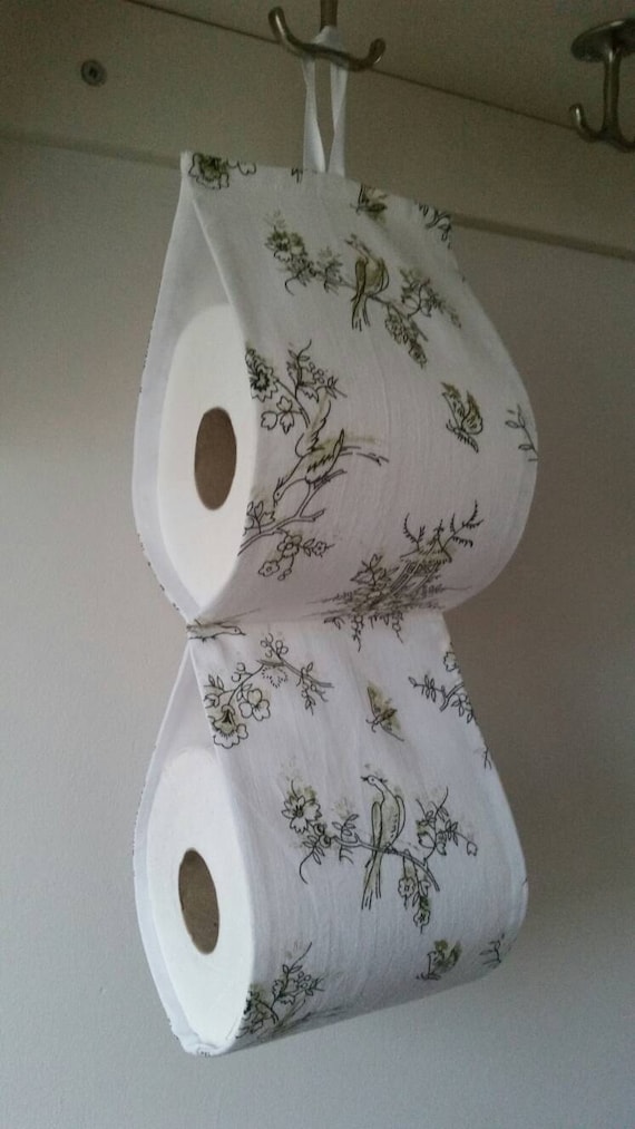 The decorative toilet paper holder storage for 2 rolls at the